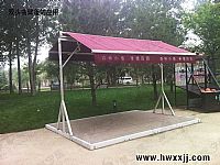 雙頭曲臂篷與環保木（mù）桌椅在戶（hù）外的應用